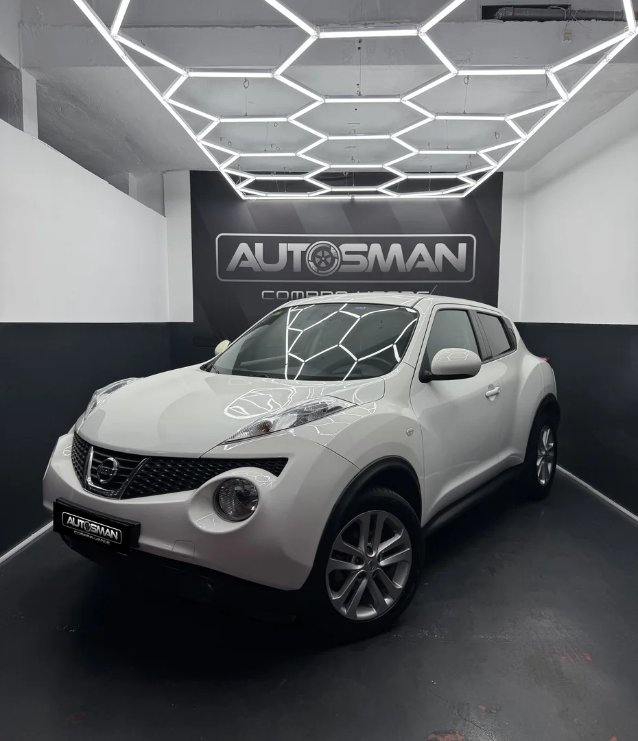 NISSAN JUKE 1.6 ACENTA 4X2 2012 Gasolina Blanco - Vista lateral